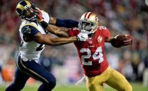 Sep 12, 2016; Santa Clara, CA, USA; San Francisco 49ers running back Shaun Draughn (24) rushes against Los Angeles Rams strong safety T.J. McDonald (25) during the first half of an NFL game at Levi's Stadium. Mandatory Credit: Kirby Lee-USA TODAY Sports